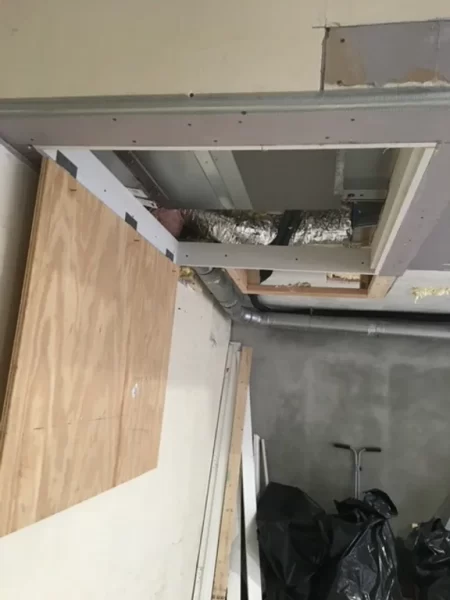 Our handyman from Northfield Handyman repaired the drywall while also installing utility access panels in this residential garage in Cambridge, MA.

