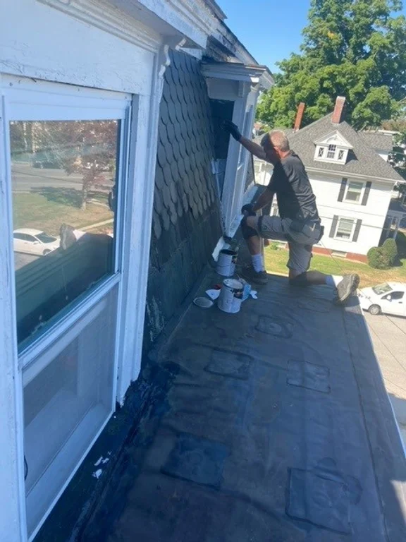 The crew from Northfield Handyman repaired the slate roof trim for this residence in Haverhill, MA.

