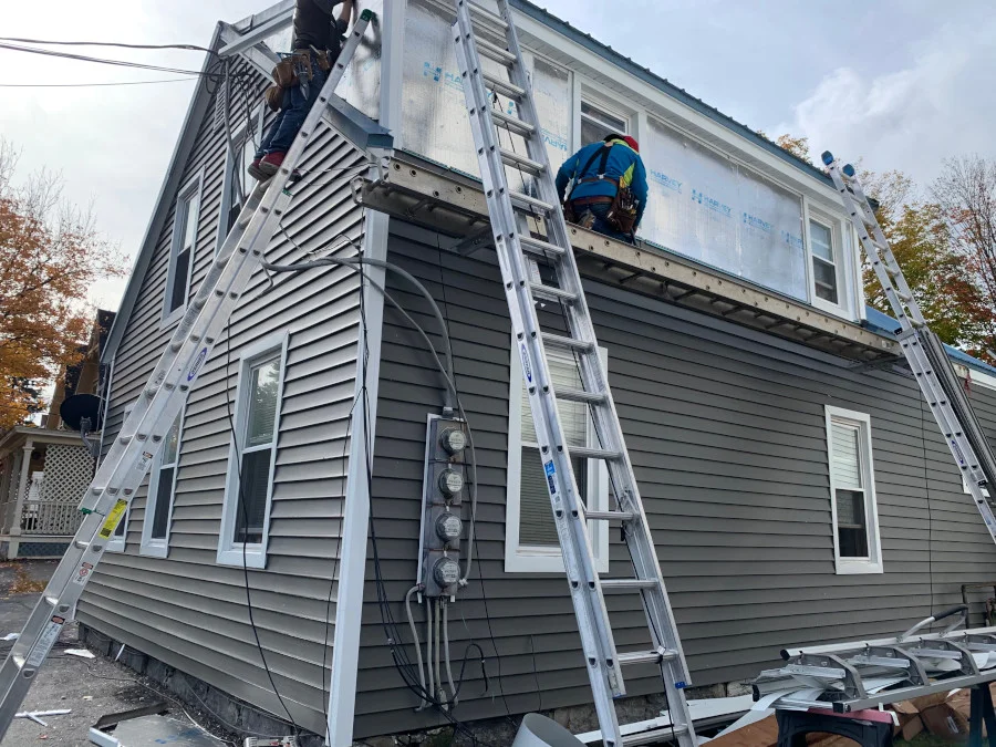 Our handymen renovated this home in Concord, NH with new siding and trim.

